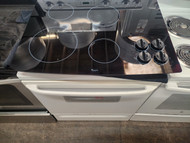 WHIRLPOOL 30 INCH GLASS COOKTOP 4 BURNER 1 LARGE 1 MEDIUM 2 SMALL BLACK LOCATED IN OUR PORTLAND OREGON APPLIANCE STORE SKU 23279