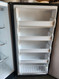 FRIGIDAIRE 14 CUBIC FOOT UPRIGHT FREEZER ADJUSTABLE PULL OUT BASKET 4 SHELVES IN DOOR PLUS TILT OUT BASKET BLACK COSMETIC ISSUE ON DOOR LOCATED IN OUR PORTLAND OREGON APPLIANCE STORE SKU 23282