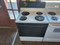 HOTPOINT 30 INCH FREESTANDING ELECTRIC RANGE COIL BURNERS 2 LARGE 2 SMALL SELF CLEANING OVEN WHITE WITH  BLACK GLASS DOOR AND CONTROL PANEL LOCATED IN OUR PORTLAND OREGON APPLIANCE STORE SKU 23297