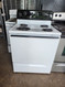 ESTATE 30 INCH FREESTANDING ELECTRIC RANGE MANUAL CLEAN COIL BURNERS 3 SMALL 1 LARGE WHITE WITH BLACK HANDLE AND PANEL LOCATED IN OUR PORTLAND OREGON APPLIANCE STORE SKU 23304