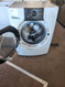 KENMORE ELITE FRONT LOAD WASHER 5 CYCLE PREWASH OPTION 4 TEMPERATURE  4 SPEED 2ND RINSE WHITE LOCATED IN OUR PORTLAND OREGON APPLIANCE STORE SKU 23919