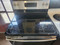 GE 30 Inch Freestanding Electric Range with 4 Element Burners, 5.3 Cu. Ft. Oven Capacity, Removable Storage Drawer, Self-Clean, Ceramic Glass Cooktop, Dual-Element Bake, Power Boil Elements Stainless SKU 23334