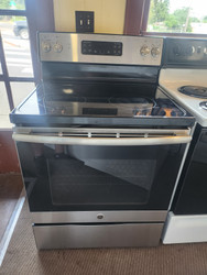 GE 30 Inch Freestanding Electric Range with 4 Element Burners, 5.3 Cu. Ft. Oven Capacity, Removable Storage Drawer, Self-Clean, Ceramic Glass Cooktop, Dual-Element Bake, Power Boil Elements Stainless SKU 23334