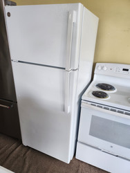 GE 28 Inch Top Freezer Refrigerator with 17.5 Cu. Ft. Capacity, Reversible Hinges, Gallon Door Shelves, Adjustable Full-Width Glass Shelves, Deli Drawer WHITE LOCATED IN OUR PORTLAND OREGON APPLIANCE STORE SKU 23339