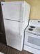 GE 28 Inch Top Freezer Refrigerator with 17.5 Cu. Ft. Capacity, Reversible Hinges, Gallon Door Shelves, Adjustable Full-Width Glass Shelves, Deli Drawer WHITE LOCATED IN OUR PORTLAND OREGON APPLIANCE STORE SKU 23339