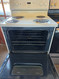 HOTPOINT 30 INCH FREESTANDING ELECTRIC RANGE MANUAL CLEAN OVEN COIL BURNERS 2 LARGE 2 SMALL WHITE LOCATED IN OUR PORTLAND OREGON APPLIANCE STORE SKU 23342