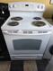 GE 30 INCH FREESTANDING ELECTRIC RANGE COIL BURNERS 2 LARGE 2 SMALL HI LO BROIL SETTING OPTION SELF CLEANING OVEN WHITE LOCATED IN OUR PORTLAND OREGON APPLIANE STORE SKU 23350