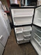 WHIRLPOOL 18 CUBIC FOOT REFRIGERATOR TOP FREEZER 4 SPLIT ADJUSTABLE GLASS SHELVES 1 DELI AND 2 CRISPER DRAWERS FULL WIDTH WIRE SHELF IN FREEZER BLACK LOCATED IN OUR PORTLAND OREGON APPLIANCE STORE SKU 23354