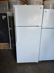 GE 28 Inch Top-Freezer Refrigerator with 17.5 cu. ft. Capacity, 2 Adjustable Spillproof Glass Shelves, Gallon Door Storage, Spillproof Freezer Floor, Air Tower, Upfront Temperature Controls and White SKU 23357