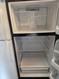 AMERICANA BY GE 16 CUBIC FOOT REFRIGERATOR TOP FREEZER WIRE SHELVES 1 LARGE CRISPER DRAWER FULL WIDTH WIRE SHELF IN FREEZER BLACK LOCATED IN OUR PORTLAND OREGON SKU 23358