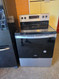 KITCHENAID FRENCH DOOR REFRIGERATOR 22 CUBIC FOOT AND WHIRLPOOL STOVE PACKAGE REFRIGERATOR ICE AND WATER GLASS SHELVES 2 CRISPER DRAWER DELI DRAWER 5 BURNER MANUAL CLEAN OVER BLACK SKU 23359