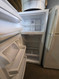GE 18 CUBIC FOOT REFRIGERATOR TOP FREEZER WIRE SHELVES 2 CRISPER DRAWERS WITH GLASS COVER WHITE LOCATED IN OUR PORTLAND OREGON APPLIANCE STORE SKU 23366