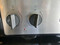 WHIRLPOOL 30 INCH FREESTANDING ELECTRIC RANGE COIL BURNERS 2 LARGE 2 SMALL KEEP WARM OPTION SELF CLEANING OVEN BLACK AND STAINLESS LOCATED IN OUR PORTLAND OREGON APPLIANCE STORE SKU 23381