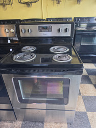 WHIRLPOOL 30 INCH FREESTANDING ELECTRIC RANGE COIL BURNERS 2 LARGE 2 SMALL KEEP WARM OPTION SELF CLEANING OVEN BLACK AND STAINLESS LOCATED IN OUR PORTLAND OREGON APPLIANCE STORE SKU 23381
