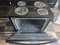 WHIRLPOOL 30 INCH FREESTANDING ELECTRIC RANGE COIL BURNERS 2 LARGE 2 SMALL KEEP WARM OPTION SELF CLEANING OVEN BLACK AND STAINLESS LOCATED IN OUR PORTLAND OREGON APPLIANCE STORE SKU 23381