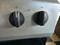 ESTATE BY WHIRLPOOL 30 INCH FREESTANDING ELECTRIC RANGE 4 COIL BURNERS 2 LARGE 2 SMALL SELF CLEANING OVEN COSMETIC ISSUES ON CONTROL PANEL SILVER AND BLACK LOCATED IN OUR PORTLAND OREGON APPLIANCE STORE SKU 23385