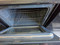 FRIGIDAIRE 30 INCH FREESTANDING ELECTRIC RANGE SELF COIL BURNERS 2 LARGE 2 SMALL BLACK WITH SILVER SORAGE DRAWER COSMETIC ISSUES WORKS GOOD LOCATED IN OUR PORTLAND OREGON APPLIANCE STORE SKU 23389