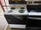 HOTPOINT 30 INCH FREESTANDING ELECTRIC RANGE COIL BURNERS 2 LARGE 2 SMALL SELF CLEANING OVEN BLACK GLASS DOOR NO WINDOW WHITE LOCATED IN OUR PORTLAND OREGON APPLIANCE STORE SKU 23403