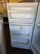 GE 15 CUBIC FOOT REFRIGERATOR TOP FREEZER AUTOMATIC DEFROST WIRE SHELVES 2 CRISPER DRAWERS WHITE LOCATED IN OUR PORTLAND OREGON APPLIANCE STORE SKU 23414