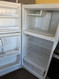 GE 15 CUBIC FOOT REFRIGERATOR TOP FREEZER AUTOMATIC DEFROST WIRE SHELVES 2 CRISPER DRAWERS WHITE LOCATED IN OUR PORTLAND OREGON APPLIANCE STORE SKU 23414