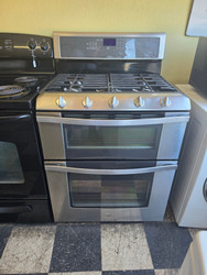 Whirlpool 30 Inch Freestanding Gas Double Oven Range with 5 Sealed Burners, 3.9 cu. ft. Lower Oven Capacity, Delay Bake, Self-Cleaning System 2.1 cu. ft. Upper Oven Capacity COSMETIC Stainless BLACK SKU 23419