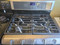 Whirlpool 30 Inch Freestanding Gas Double Oven Range with 5 Sealed Burners, 3.9 cu. ft. Lower Oven Capacity, Delay Bake, Self-Cleaning System 2.1 cu. ft. Upper Oven Capacity COSMETIC Stainless BLACK SKU 23419
