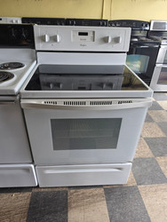 WHIRLPOOL 30 INCH FREESTANDING GLASS TOP ELECTRIC RANGE 4 BURNERS 1 LARGE DUAL 1 LARGE 2 SMALL MANUAL CLEAN OVEN STORAGE DRAWER WHITE LOCATED IN OUR PORTLAND OREGON APPLIANCE STORE SKU 23422