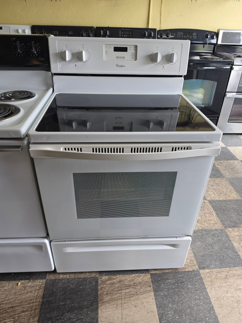 WHIRLPOOL 30 INCH FREESTANDING GLASS TOP ELECTRIC RANGE 4 BURNERS 1 LARGE DUAL 1 LARGE 2 SMALL MANUAL CLEAN OVEN STORAGE DRAWER WHITE LOCATED IN OUR PORTLAND OREGON APPLIANCE STORE SKU 23422