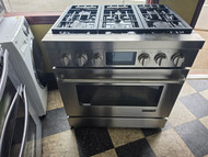 JENN-AIR 36 INCH FREESTANDING DUAL FUEL RANGE 6 BURNER DUAL CONVECTION MOTOR HEAVY DUTY BURNER GRATES STAINLESS LOCATED IN OUR PORTLAND OREGON APPLIANCE STORE SKU 23830