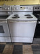WHIRLPOOL 30 INCH FREESTANDING ELECTRIC RANGE COIL BURNERS SELF CLEANING OVEN GLASS DOOR NO WINDOW WHITE LOCATED IN OUR PORTLAND OREGON APPLIANCE STORE SKU 23835