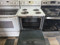 WHIRLPOOL 30 INCH FREESTANDING ELECTRIC RANGE COIL BURNERS SELF CLEANING OVEN GLASS DOOR NO WINDOW WHITE LOCATED IN OUR PORTLAND OREGON APPLIANCE STORE SKU 23835