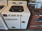 VINTAGE MAGIC CHEF 30 INCH GAS RANGE 4 BURNER SWING OUR BROILER DRAWER WHITE LOCATED IN OUR PORTLAND OREGON APPLIANCE STORE SKU 23837