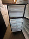 WHIRLPOOL 18 CUBIC REFRIGERATOR WITH ICE MAKER 4 SPLIT ADJUSTABLE GLASS SHELVES 2 CRISPER DRAWERS 1 DELI DRAWER BLACK LOCATED IN OUR PORTLAND OREGON APPLIANCE STORE SKU 23840