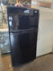 WHIRLPOOL GOLD 20 CUBIC FOOT REFRIGERATOR TOP FREEZER 4 SPLIT GLASS SHELVES 2 CRIPER DRAWERS 1 DELI DRAWER GLOSS BLACK LOCATED IN OUR PORTLAND OREGON APPLIANCE STORE SKU 23841