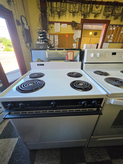 WHITE WESTINGHOUSE 30 INCH FREESTANDING ELECTRIC RANGE MANUAL CLEAN OVEN COIL BURNERS 3 SMALL 1 LARGE WHITE LOCATED IN OUR PORTLAND OREGON APPLIANCE STORE SKU 23847