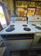 WHITE WESTINGHOUSE 30 INCH FREESTANDING ELECTRIC RANGE MANUAL CLEAN OVEN COIL BURNERS 3 SMALL 1 LARGE WHITE LOCATED IN OUR PORTLAND OREGON APPLIANCE STORE SKU 23847