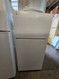 GE 14 CUBIC FOOT POCKET DOOR REFRIGERATOR TOP FREEZER WIRE SHELVES 2 CRISPER DRAWERS WHITE LOCATED IN OUR PORTLAND OREGON APPLIANCE STORE SKU 23854