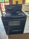 FRIGIDAIRE 30 INCH FREESTANDING ELECTRIC RANGE MANUAL CLEAN COIL BURNERS 2 LARGE 2 SMALL BLACK LOCATED IN OUR PORTLAND OREGON APPLIANCE STORE SKU 23855