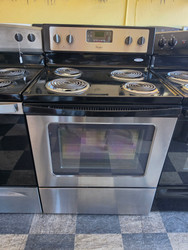 WHIRLPOOL 30 INCH FREESTANDING ELECTRIC RANGE KEEP WARM OPTION SELF CLEANING OVEN DELAY START TIME SLAINLESS BLACK LOCATED IN OUR PORTLAND OREGON APPLIANCE STORE SKU 23866