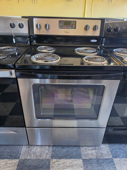 WHIRLPOOL 30 INCH FREESTANDING ELECTRIC RANGE KEEP WARM OPTION SELF CLEANING OVEN DELAY START TIME SLAINLESS BLACK LOCATED IN OUR PORTLAND OREGON APPLIANCE STORE SKU 23866