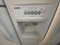 KENMORE 26 CUBIC FOOT SIDE BY SIDE REFRIGERATOR WITH ICE AND WATER GLASS SHELVES 3 DRAWERS 1 DELI 2 CRISPER 4 WIRE SHELVES IN FREEZER 1 PULL OUT BIN WHITE LOCATED IN OUR PORTLAND OREGON APPLIANCE STORE SKU 23877