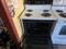 HOTPOINT 30 INCH ELECTRIC FREESTANDING MANUAL CLEAN COIL BURNERS 3 SMALL 1 LARGE WHITE WITH BLACK GLASS DOOR WITH WINDOW LOCATED IN OUR PORTLAND OREGON APPLIANCE STORE SKU 23888