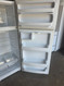 Hotpoint 28 Inch Top Freezer Refrigerator with 2 Adjustable Wire Shelves, 2 Clear Drawers, Gallon Door Storage, Dairy Bin, White LOCATED IN OUR PORTLAND OREGON APPLIANCE STORE SKU 23890
