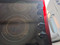 KENMORE BY FRIGIDAIRE 30 INCH GLASS COOKTOP 4 BURNER 1 LARGE DUAL 1 LARGE 2 SMALL LEFT FRONT BURNER HAS SIMMER SELECT OPTION BLACK LOCATED IN OUR PORTLAND OREGON APPLIANCE STORE 23891