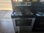WHIRLPOOL 30 INCH FREESTANDING ELECTRIC RANGE SELF CLEANING OVEN COIL BURNERS 2 SMALL 2 LARGE KEEP WARM OPTION STAINLESS AND BLACK LOCATED IN OUR PORTLAND OREGON APPLIANCE STORE SKU 23895