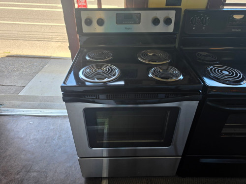 WHIRLPOOL 30 INCH FREESTANDING ELECTRIC RANGE SELF CLEANING OVEN COIL BURNERS 2 SMALL 2 LARGE KEEP WARM OPTION STAINLESS AND BLACK LOCATED IN OUR PORTLAND OREGON APPLIANCE STORE SKU 23895