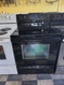 WHIRLPOOL 30 INCH FREESTANDING GLASS TOP RANGE 4 BURNER 1 LARGE DUAL 1 LARGE 2 SMALL SELF CLEANING OVEN KEEP WARM OPTION BLACK LOCATED IN OUR PORTLAND OREGON APPLIANCE STORE SKU 23898