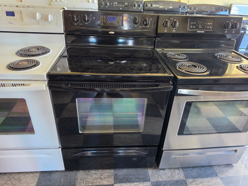 WHIRLPOOL 30 INCH FREESTANDING GLASS TOP RANGE 4 BURNER 1 LARGE DUAL 1 LARGE 2 SMALL SELF CLEANING OVEN KEEP WARM OPTION BLACK LOCATED IN OUR PORTLAND OREGON APPLIANCE STORE SKU 23898