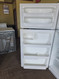 FRIGIDAIRE 18 CUBIC FOOT REFRIGERATOR TOP FREEZER GLASS SHELVES 2 CRISPER DRAWERS 1 DELI DRAWER FULL WIDTH WIRE SHELF IN FREEZER COSMETIC ISSUE IN DAIRY STORAGE SEE PIC WHITE LOCATED IN OUR PORTLAND OREGON APPLIANCE STORE SKU 23901