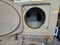 GE SPACE MAKER 24 INCH LAUNDRY CENTER BY WHIRLPOOL WASHER  7 CYCLE  3 TEMPERATURE 3 WATER LEVELS DRYER 4 CYCLE HIGH HEAT AUTO DRY LOW HEAT AUTO DRY HIGH HEAT TIMED DRY PLUS AIR FLUFF LOCATED IN OUR PORTLAND OREGON APPLIANCE STORE SKU 23717